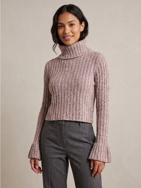 Free People || Woman’s Twisted Cable Turtleneck Sweater size Medium